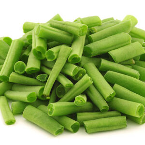 cut small and slender green beans (haricot vert) on a white background